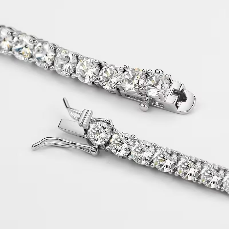 Close-up of a moissanite silver bracelet on a light gray background