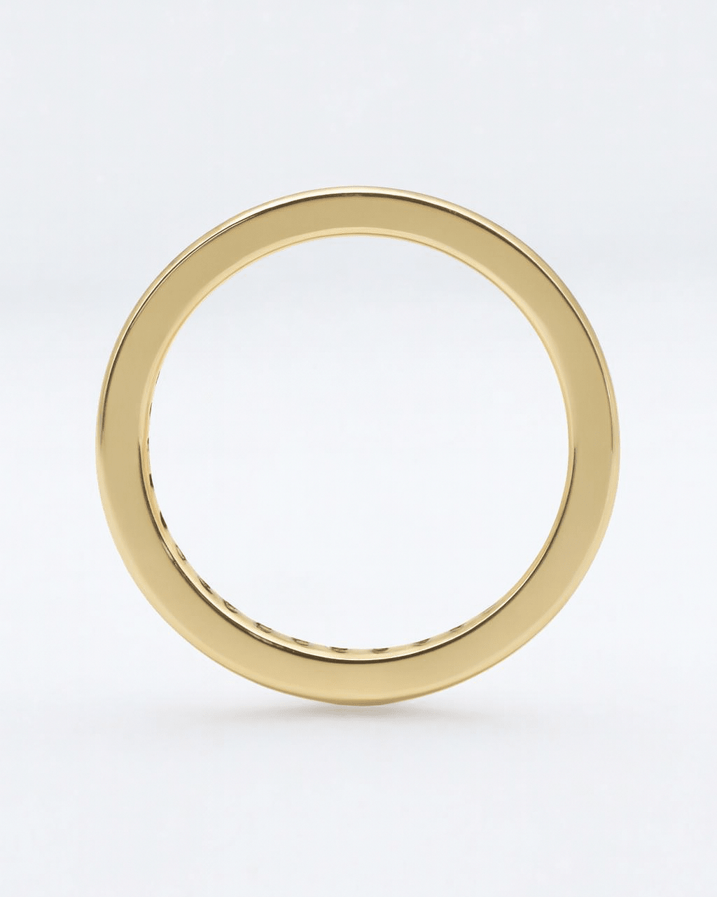 Gold ring on a white background