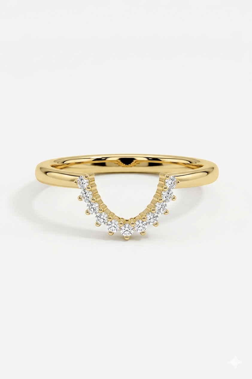 Gold ring with small diamonds on a white background