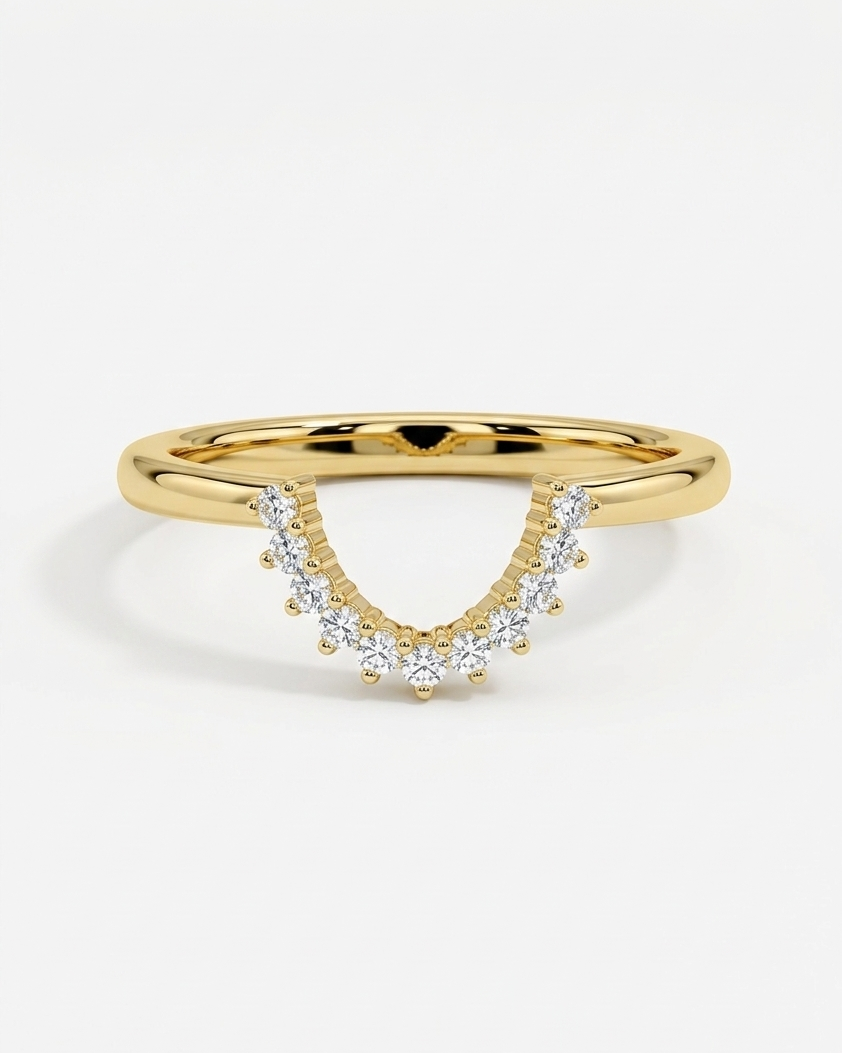 Gold ring with small diamonds on a white background