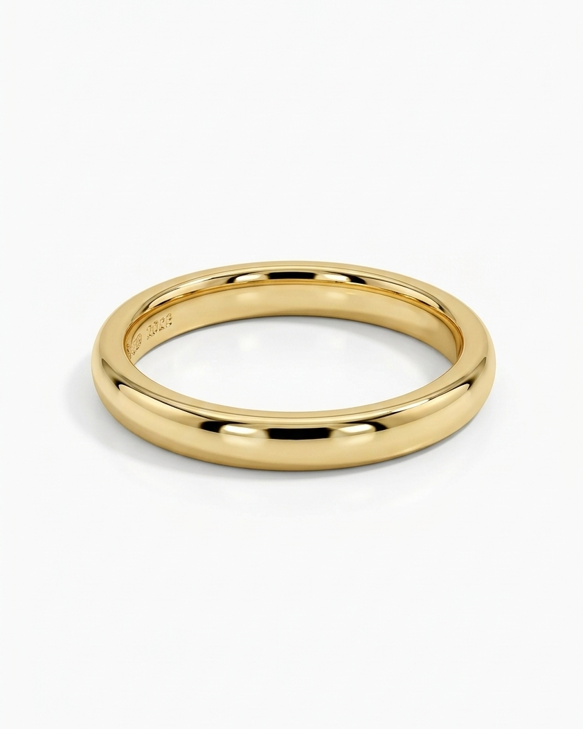 Gold ring on a white background