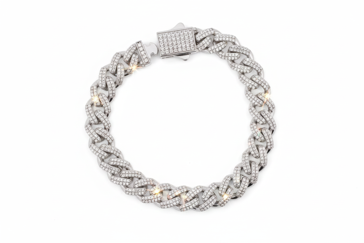 Silver braided bracelet with a clasp on a white background