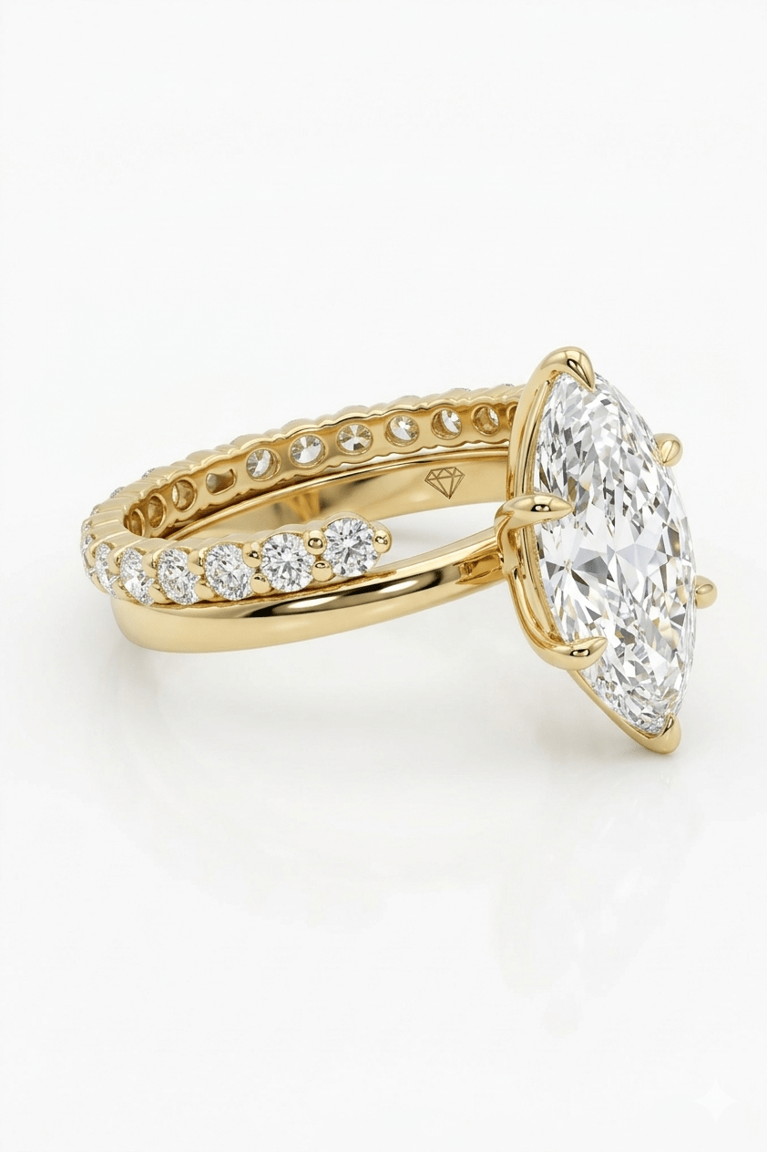 Gold ring with a large diamond and smaller diamonds on a white background