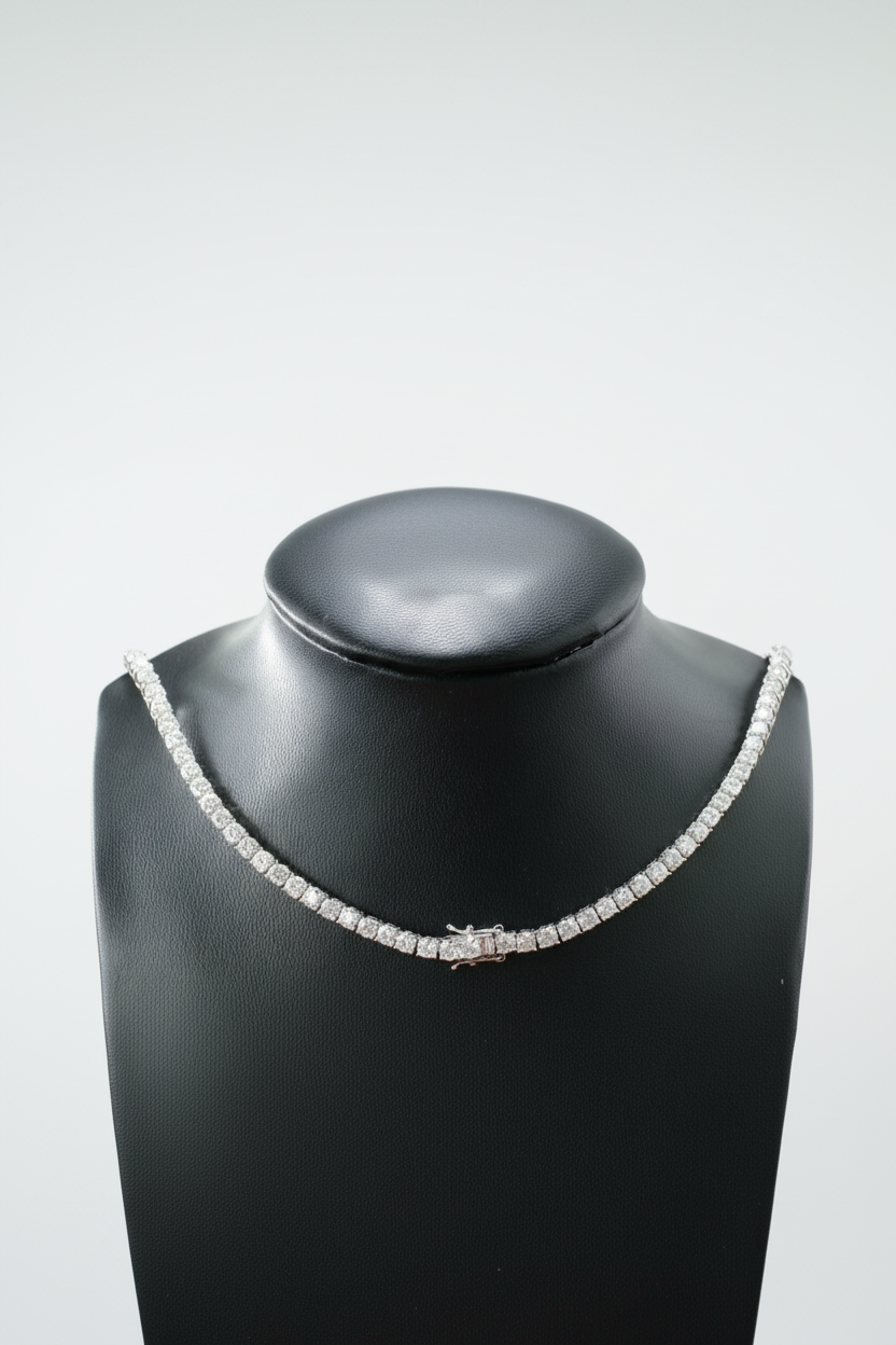 tennis silver necklace on a black mannequin bust