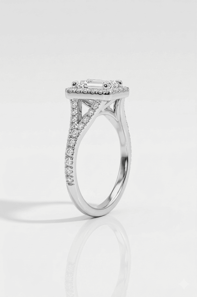 Silver ring with diamond accents on a light gray background