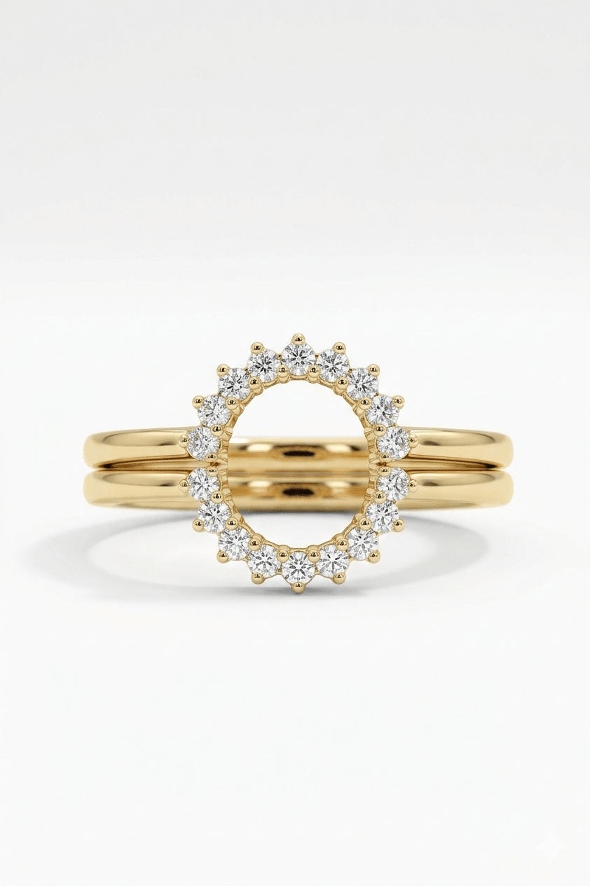 Gold ring with diamond accents on a white background