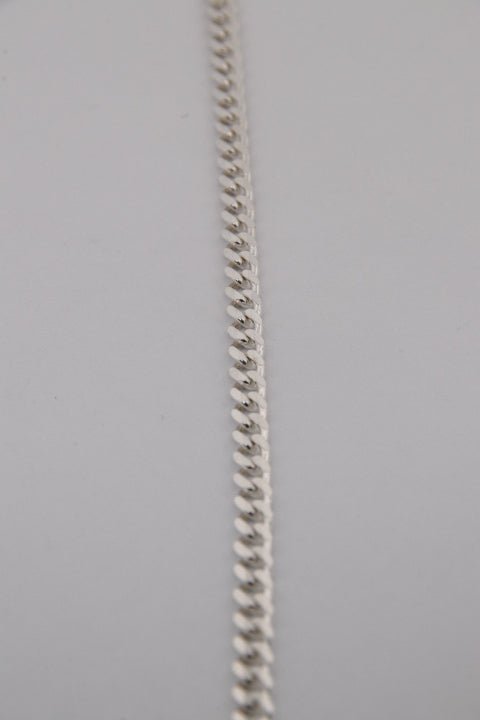 Silver chain on a gray background