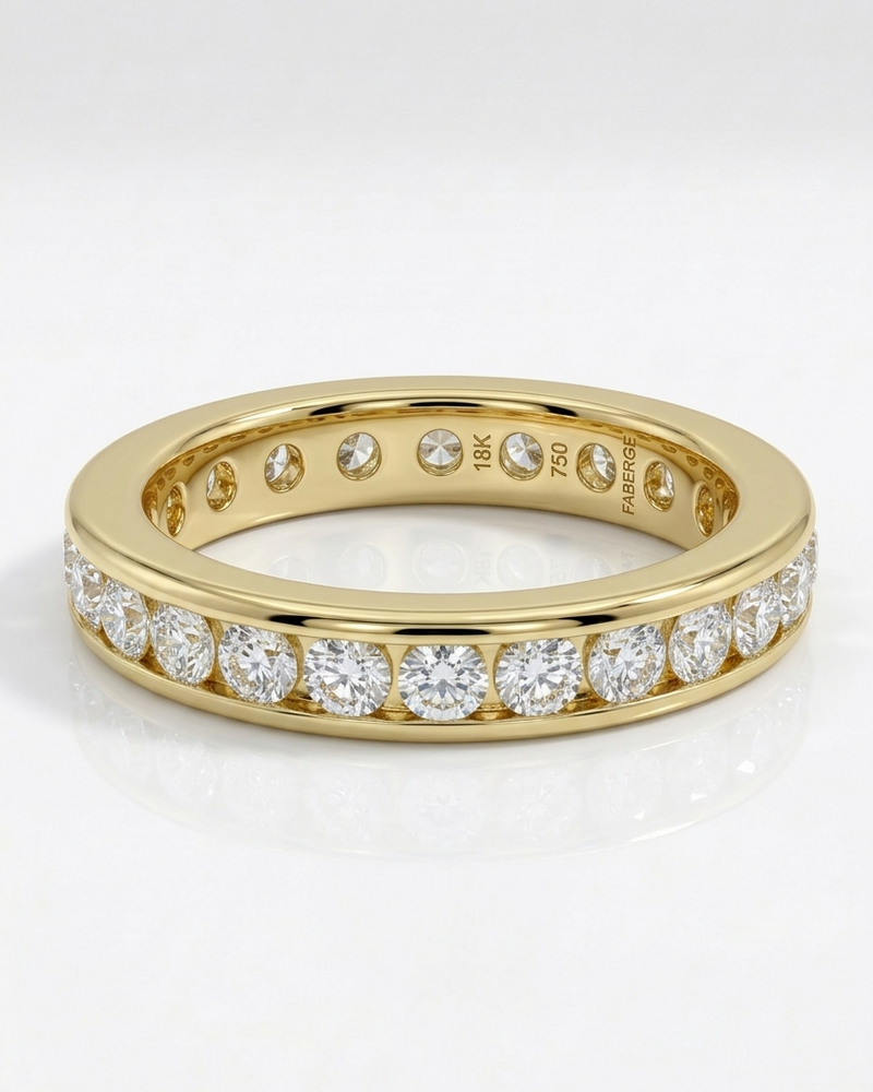 Gold ring with diamonds on a white background