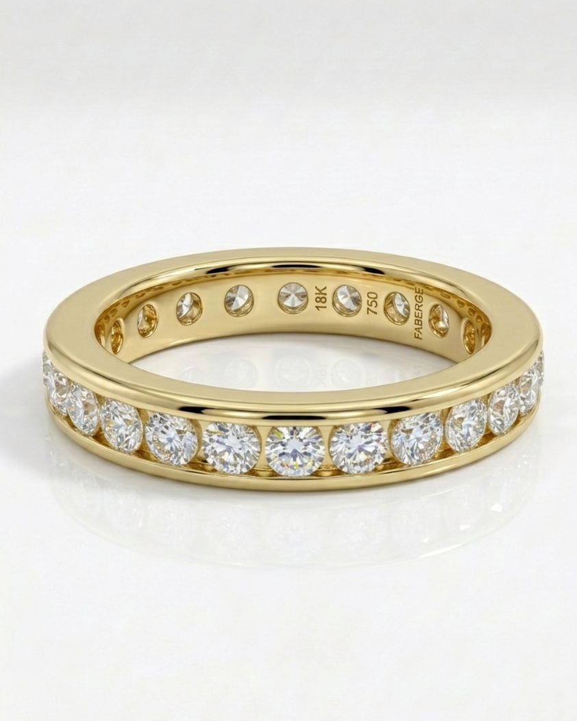 Gold wedding band with diamonds on a white background