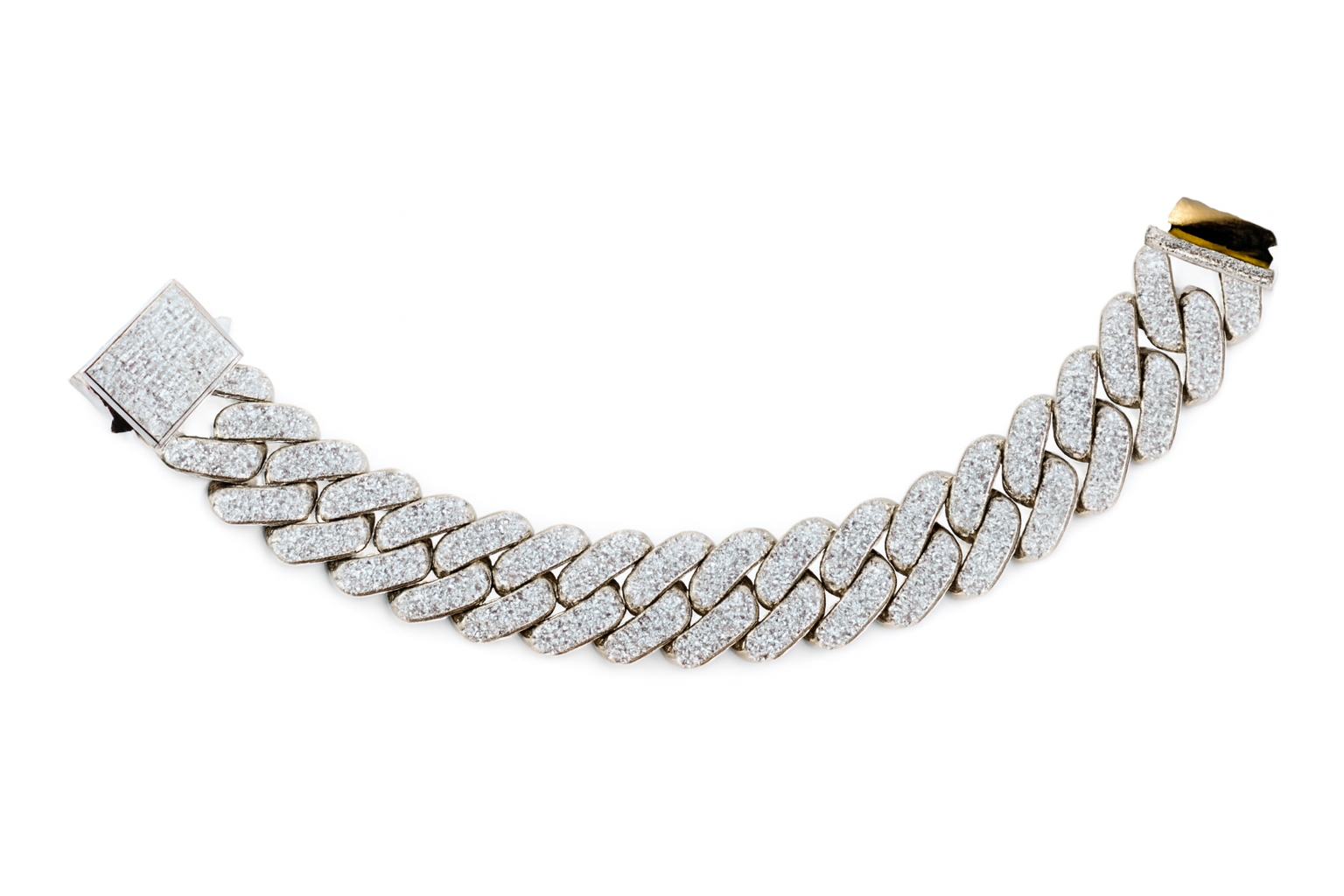 Silver chain bracelet with diamond-like stones on a white background